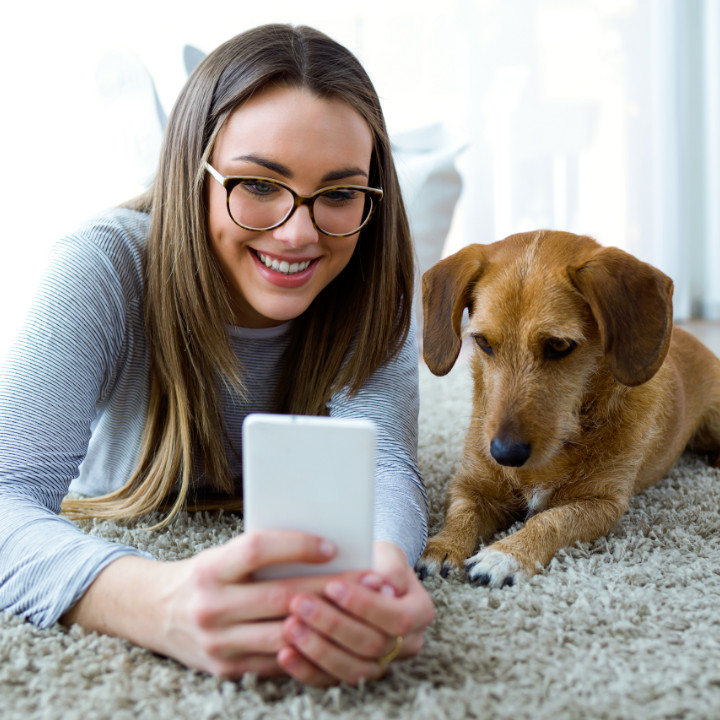 girl on app with dog