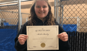 QC graduate, Alesha Stanley, with certification