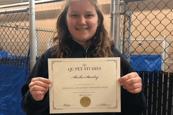 QC graduate, Alesha Stanley, with certification